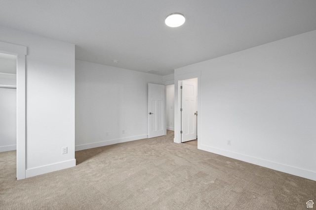 1766 W 160 S Unit 49, Pleasant Grove, UT 84062 - unfurnished bedroom featuring a spacious closet, carpet, and a closet