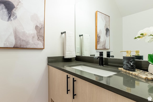 4337 W 5430 S Unit D, Roy, UT 84067 - bathroom featuring vanity and vaulted ceiling