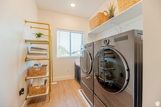 4337 W 5430 S Unit D, Roy, UT 84067 - washroom with washing machine and clothes dryer, baseboards, light wood-style floors, and recessed lighting