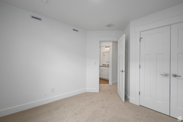 1776 W 160 S Unit 50, Pleasant Grove, UT 84062 - unfurnished bedroom featuring light colored carpet and a closet
