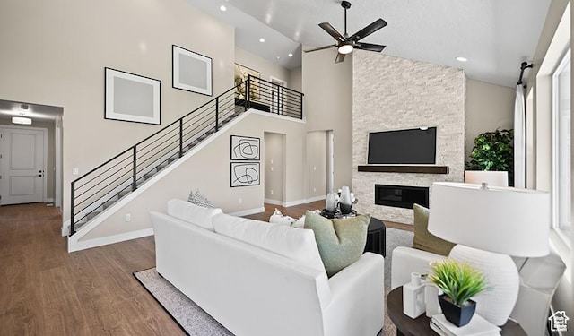 1044 S 3170 E Unit 219, Spanish Fork, UT 84660 - living room with a ceiling fan, high vaulted ceiling, wood finished floors, stairs, and recessed lighting