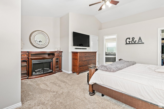 137 Stern Ct, Stansbury Park, UT 84074 - bedroom featuring carpet, lofted ceiling, baseboards, connected bathroom, and a ceiling fan