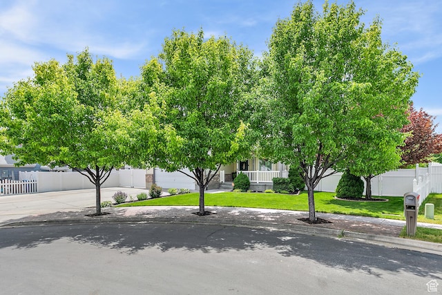 137 Stern Ct, Stansbury Park, UT 84074 - obstructed view of property featuring covered porch