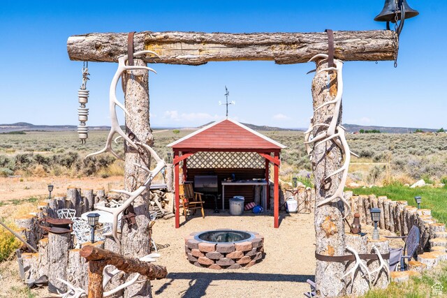 16 E Pearly Ln, La Sal, UT 84530 - view of yard featuring a fire pit and a gazebo