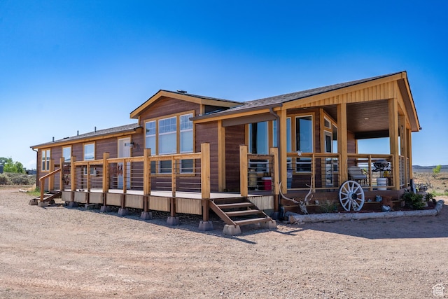 16 E Pearly Ln, La Sal, UT 84530 - back of property with roof with shingles and a deck