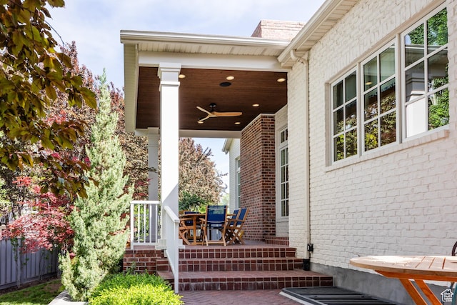 2590 E Olympus Dr, Holladay, UT 84124 - entrance to property with a ceiling fan, covered porch, and brick siding