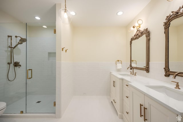 2590 E Olympus Dr, Holladay, UT 84124 - full bath featuring a stall shower, double vanity, toilet, and recessed lighting