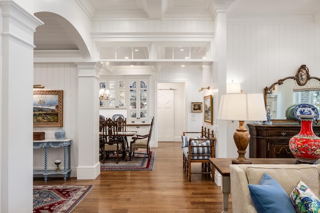 2590 E Olympus Dr, Holladay, UT 84124 - living room featuring wood finished floors, crown molding, beam ceiling, and ornate columns