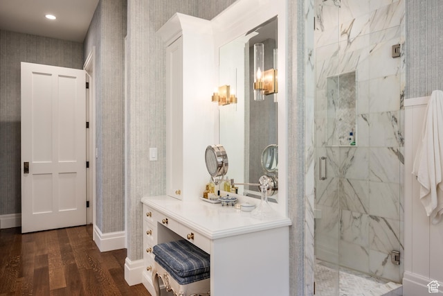 2590 E Olympus Dr, Holladay, UT 84124 - full bath featuring a marble finish shower, wood finished floors, wallpapered walls, baseboards, and vanity
