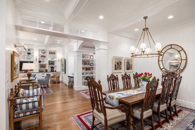 2590 E Olympus Dr, Holladay, UT 84124 - dining space with ornate columns, ornamental molding, a chandelier, beam ceiling, and wood finished floors