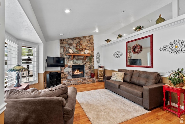 896 E 380 N, Heber City, UT 84032 - living area with lofted ceiling, light wood-style floors, and a stone fireplace