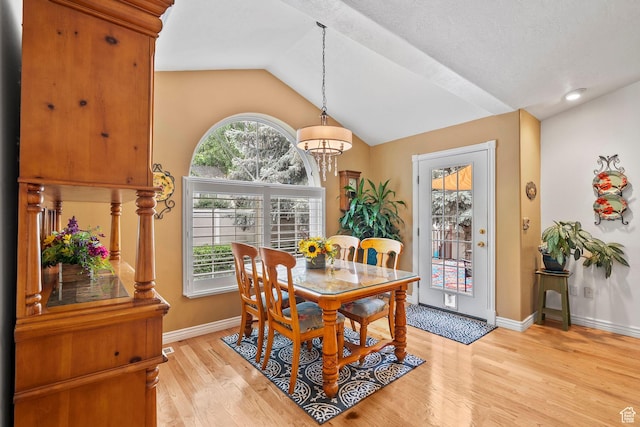 896 E 380 N, Heber City, UT 84032 - dining area featuring lofted ceiling, light wood finished floors, and baseboards