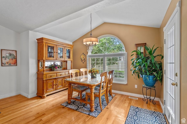 896 E 380 N, Heber City, UT 84032 - dining area with lofted ceiling, light wood finished floors, a chandelier, and baseboards