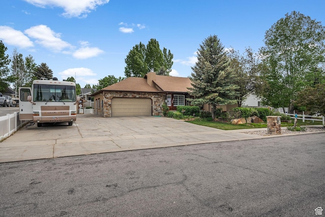 896 E 380 N, Heber City, UT 84032 - view of front of property with a garage, stone siding, and driveway