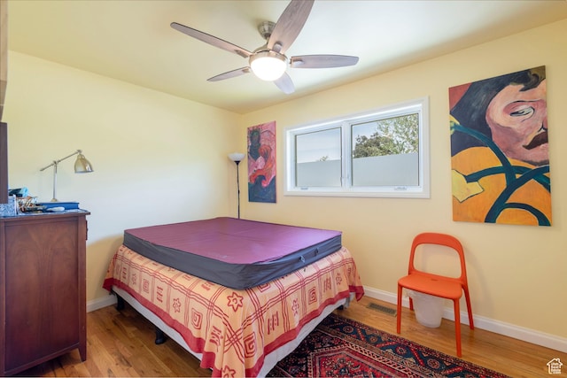 3555 E Hermes Dr S, Salt Lake City, UT 84124 - bedroom featuring wood finished floors, baseboards, and ceiling fan