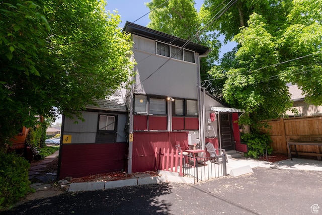 233 S 1100 E, Salt Lake City, UT 84102 - back of property with a patio area