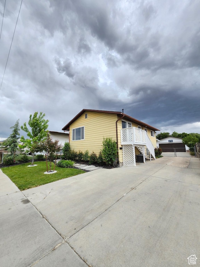 317 S 200 W, Price, UT 84501 - view of home's exterior featuring a yard and stairs