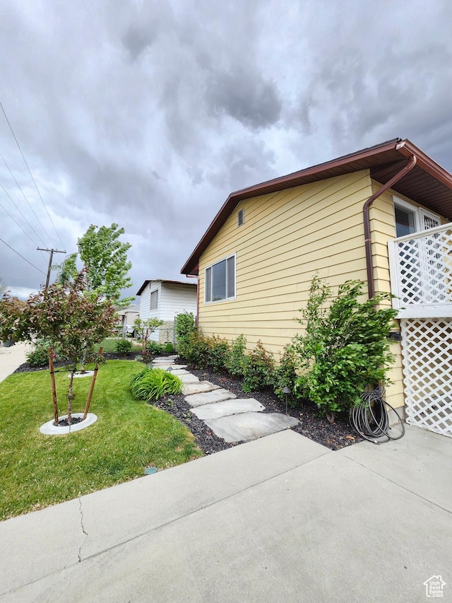 317 S 200 W, Price, UT 84501 - view of side of property featuring a lawn