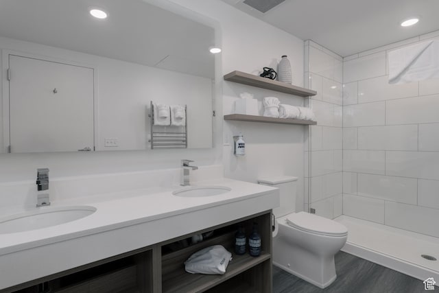 2670 Canyons Resort Dr Unit 113, Park City, UT 84098 - full bath with toilet, double vanity, a tile shower, wood finished floors, and recessed lighting