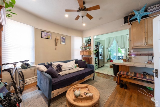 237 S 1100 E, Salt Lake City, UT 84102 - living room with ceiling fan, light wood-type flooring, recessed lighting, and radiator