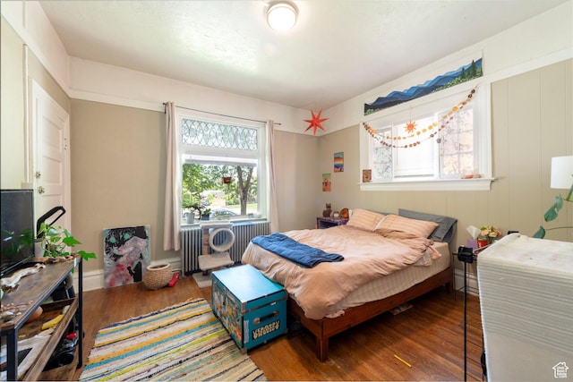 237 S 1100 E, Salt Lake City, UT 84102 - bedroom with wood finished floors and radiator heating unit