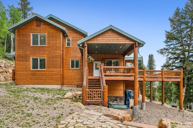 4708 Red Fir Way, Oakley, UT 84055 - back of property with faux log siding and a deck