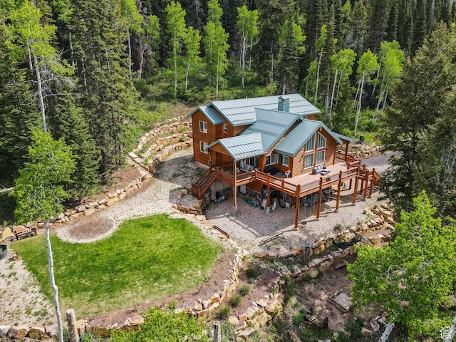 4708 Red Fir Way, Oakley, UT 84055 - back of house featuring a wooden deck, a view of trees, metal roof, stairs, and a yard