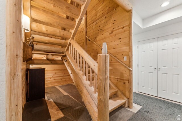 4708 Red Fir Way, Oakley, UT 84055 - stairs with carpet flooring, wood walls, and recessed lighting