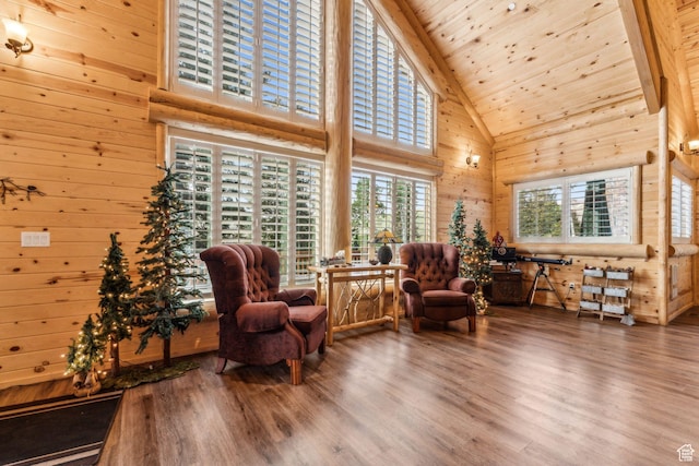 4708 Red Fir Way, Oakley, UT 84055 - living area with high vaulted ceiling, wooden walls, wood finished floors, and wooden ceiling