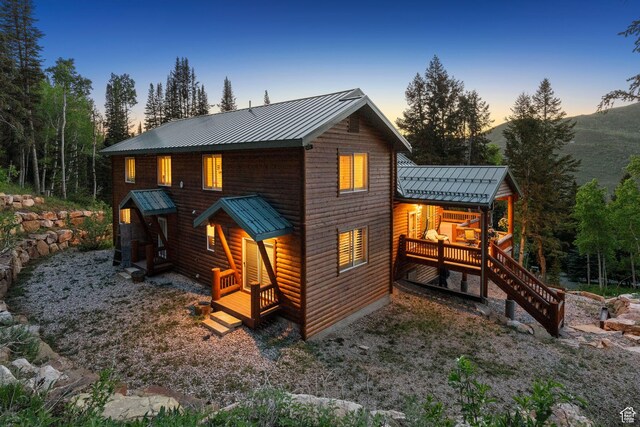 4708 Red Fir Way, Oakley, UT 84055 - rear view of property with metal roof, a standing seam roof, and log veneer siding