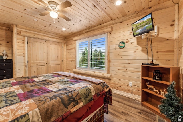 4708 Red Fir Way, Oakley, UT 84055 - bedroom featuring wood ceiling, wood finished floors, recessed lighting, wood walls, and ceiling fan