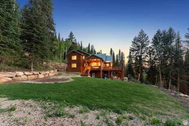 4708 Red Fir Way, Oakley, UT 84055 - back of property with a wooden deck, stairs, a yard, a view of trees, and metal roof