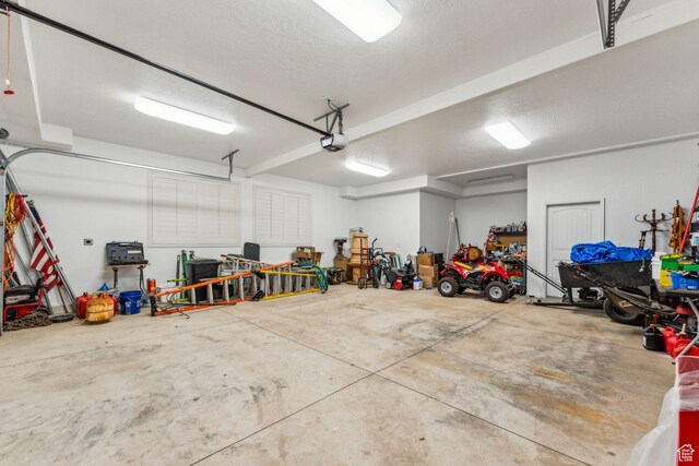 4708 Red Fir Way, Oakley, UT 84055 - garage featuring a garage door opener