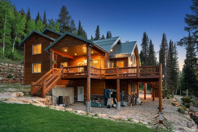 4708 Red Fir Way, Oakley, UT 84055 - back of house with stairs, a wooden deck, log veneer siding, and metal roof