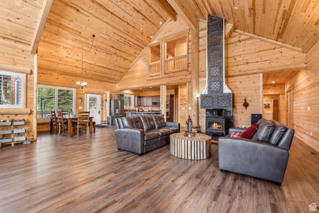 4708 Red Fir Way, Oakley, UT 84055 - living room featuring high vaulted ceiling, wooden ceiling with exposed beams, a wood stove, a chandelier, and wood finished floors