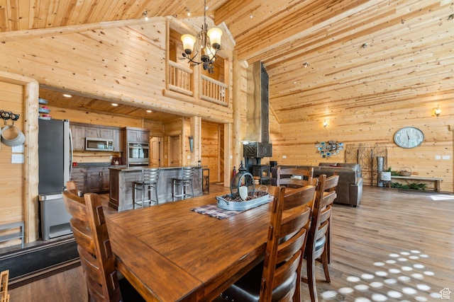 4708 Red Fir Way, Oakley, UT 84055 - dining area with wood ceiling, wooden walls, light wood-style floors, a chandelier, and high vaulted ceiling