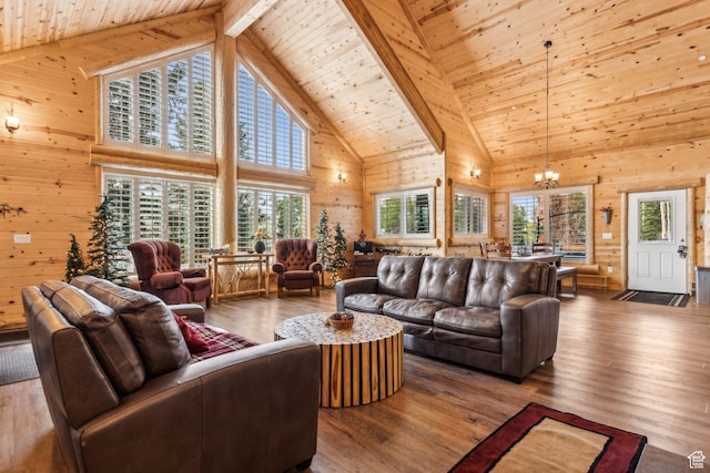 4708 Red Fir Way, Oakley, UT 84055 - living room with wooden walls, high vaulted ceiling, a chandelier, wooden ceiling with exposed beams, and wood finished floors