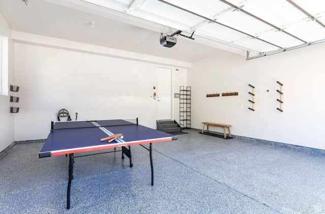 12852 N Belaview Way, Hideout, UT 84036 - recreation room with speckled floor, a garage, and baseboards