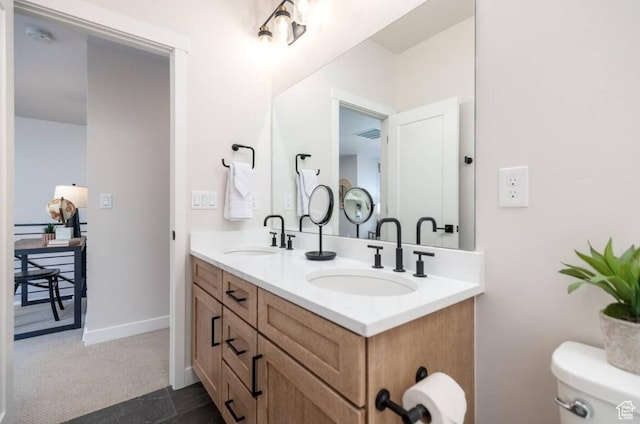 12852 N Belaview Way, Hideout, UT 84036 - bathroom with double vanity, toilet, and baseboards