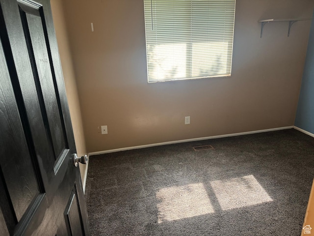 1162 N Liberty Ave, North Ogden, UT 84404 - carpeted spare room featuring baseboards