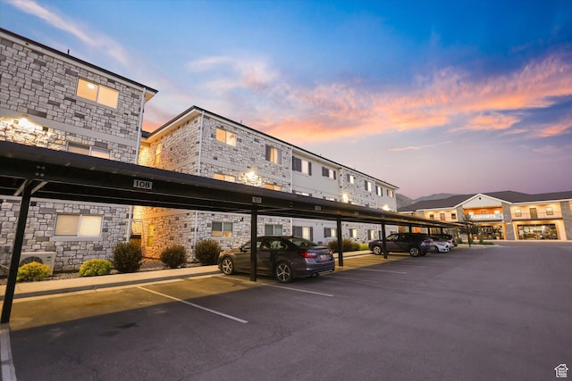 67 W 600 S Unit B204, Springville, UT 84663 - property at dusk featuring covered parking