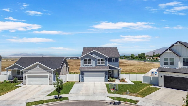432 W 1470 N, Tooele, UT 84074 - traditional home featuring a mountain view, driveway, and a garage