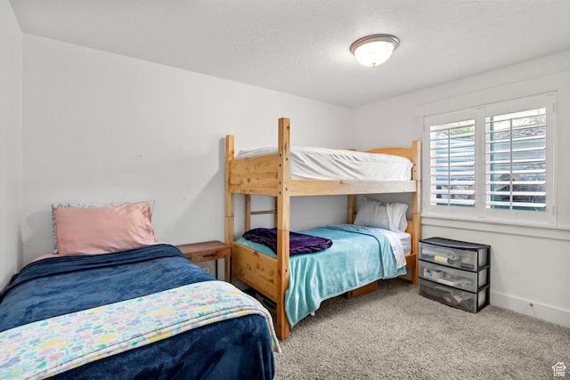 432 W 1470 N, Tooele, UT 84074 - carpeted bedroom featuring a textured ceiling and baseboards