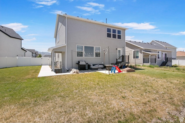 432 W 1470 N, Tooele, UT 84074 - back of property featuring a patio area, a fenced backyard, stucco siding, and an outdoor living space