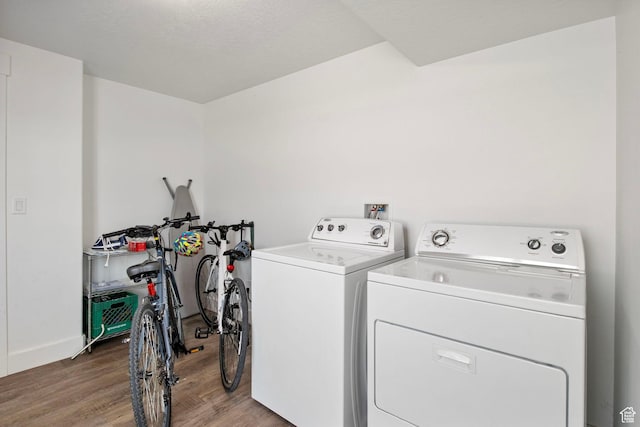 432 W 1470 N, Tooele, UT 84074 - laundry area featuring independent washer and dryer and wood finished floors