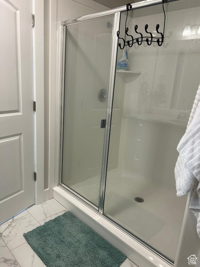 432 W 1470 N, Tooele, UT 84074 - bathroom featuring marble look tiles and a stall shower