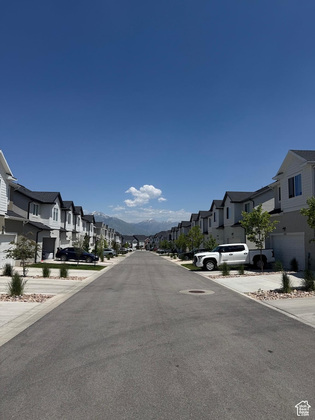4569 W Ruple Ridge Ln S, Herriman, UT 84096 - view of asphalt road with a residential view and a mountain view