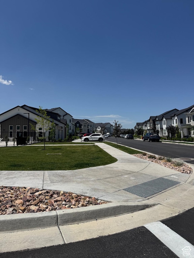 4569 W Ruple Ridge Ln S, Herriman, UT 84096 - view of asphalt road with a residential view and sidewalks