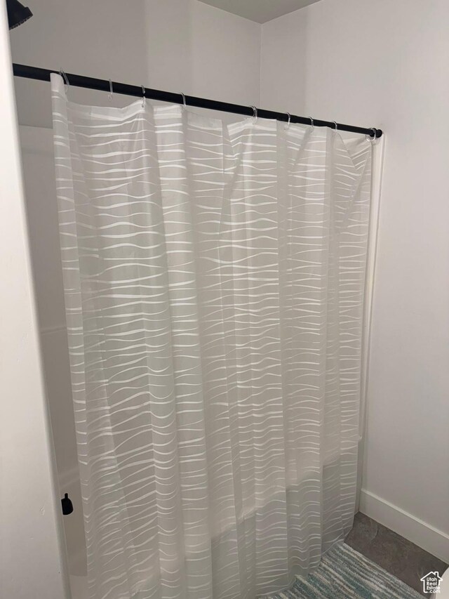 4569 W Ruple Ridge Ln S, Herriman, UT 84096 - bathroom view of a shower with curtain