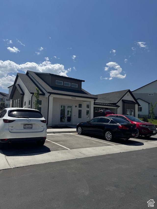 4569 W Ruple Ridge Ln S, Herriman, UT 84096 - view of front of home featuring uncovered parking and french doors